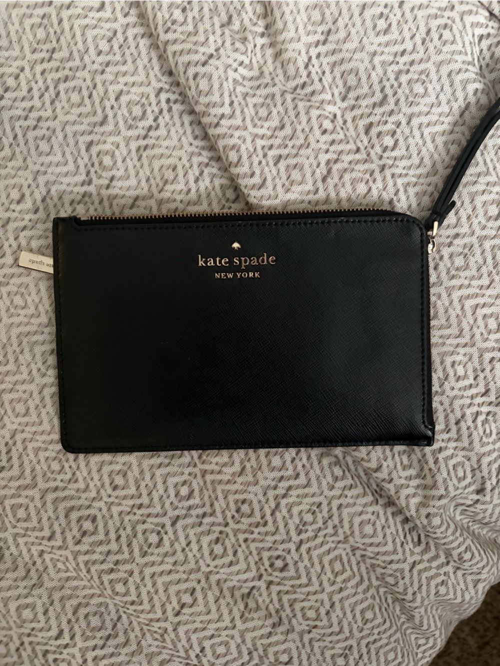 kate spade black zip wristlet with gold logo